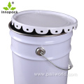 large colored oval tin metal bucket with handle